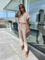 Xiomara Sleeved V-Neck Slip Pocket Elastic Jumpsuits - Vestir en Moda