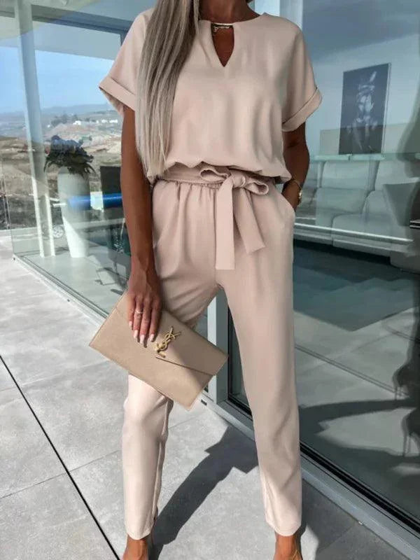 Xiomara Sleeved V-Neck Slip Pocket Elastic Jumpsuits - Vestir en Moda