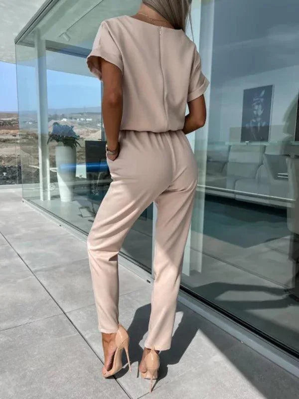 Xiomara Sleeved V-Neck Slip Pocket Elastic Jumpsuits - Vestir en Moda