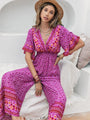 Kimberli Floral Surplice Flutter Sleeve Jumpsuits