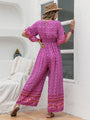 Kimberli Floral Surplice Flutter Sleeve Jumpsuits